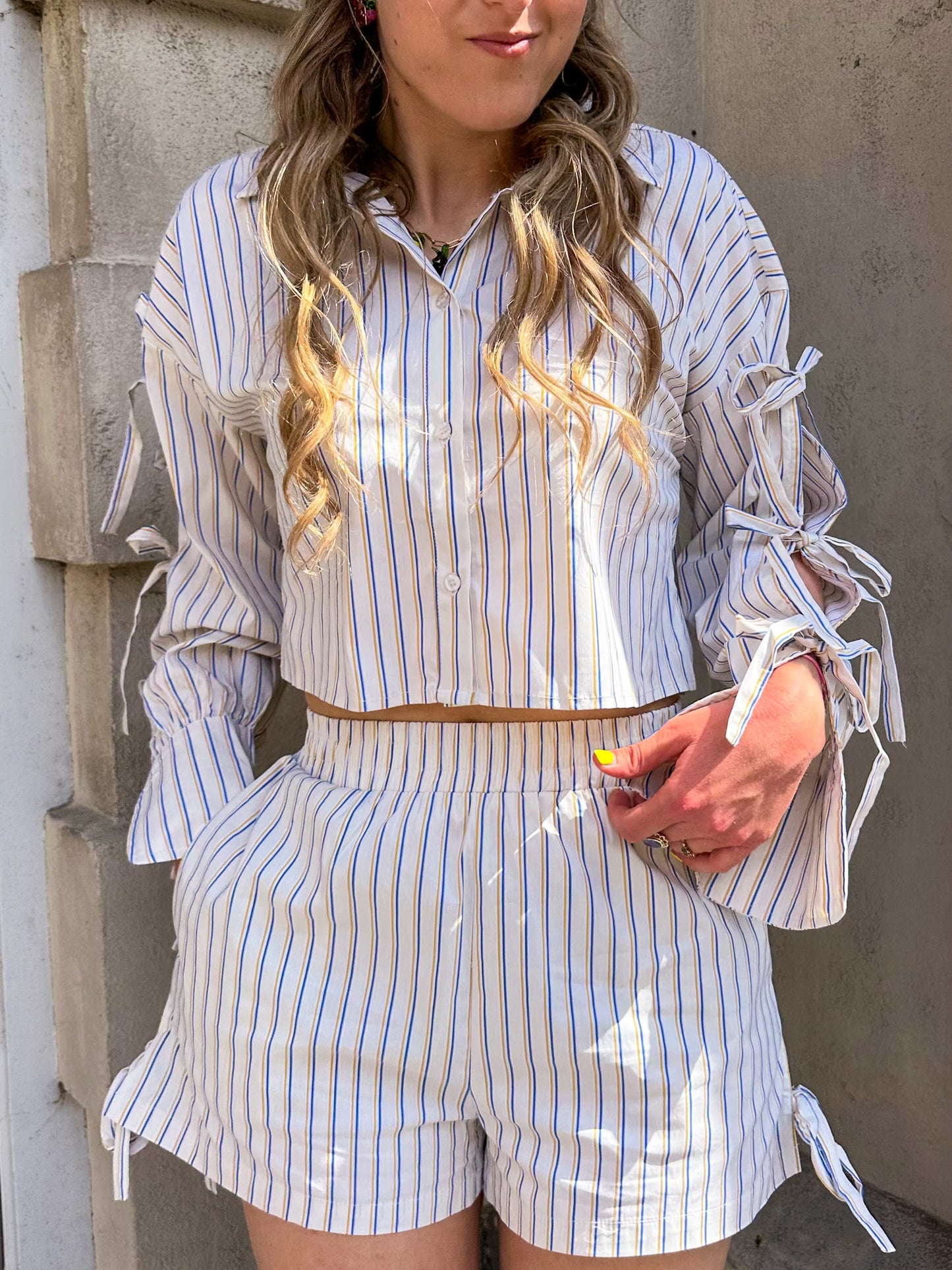 Gestreepte blouse met strikken