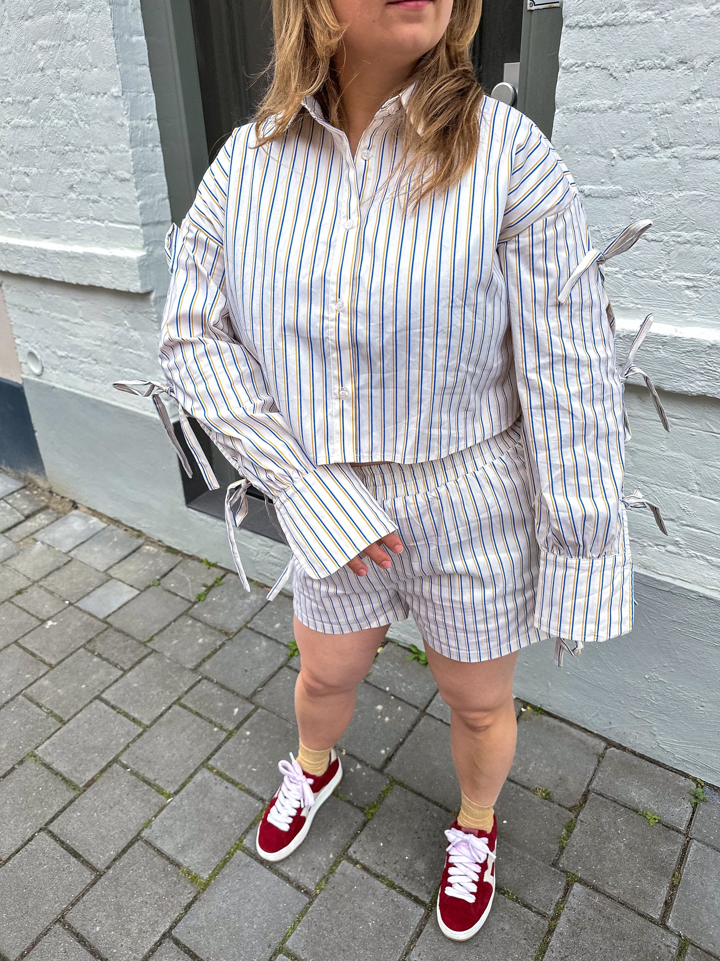 Gestreepte blouse met strikken