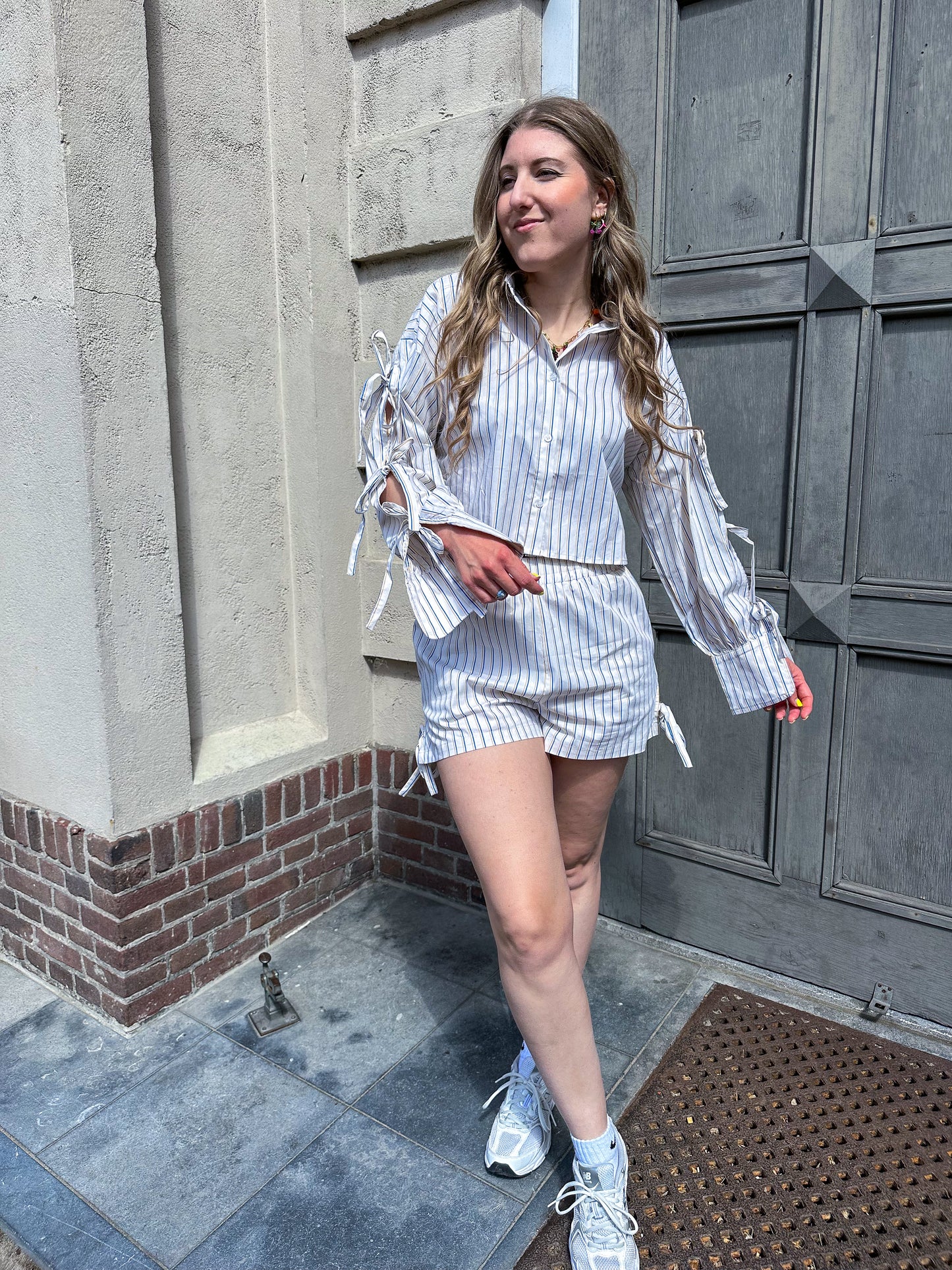 Gestreepte blouse met strikken