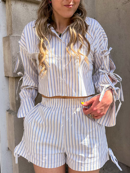 Gestreepte blouse met strikken