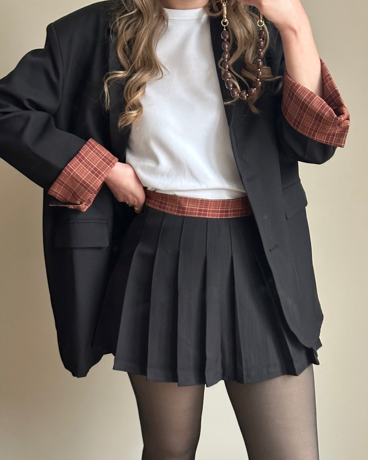 Angela skort zwart met ruit detail