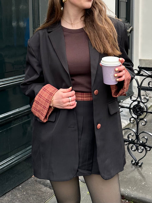 Angela skort zwart met ruit detail