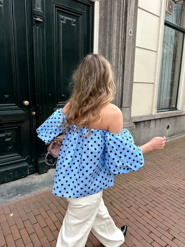 Polkadot top met afzakkende mouwen blauw