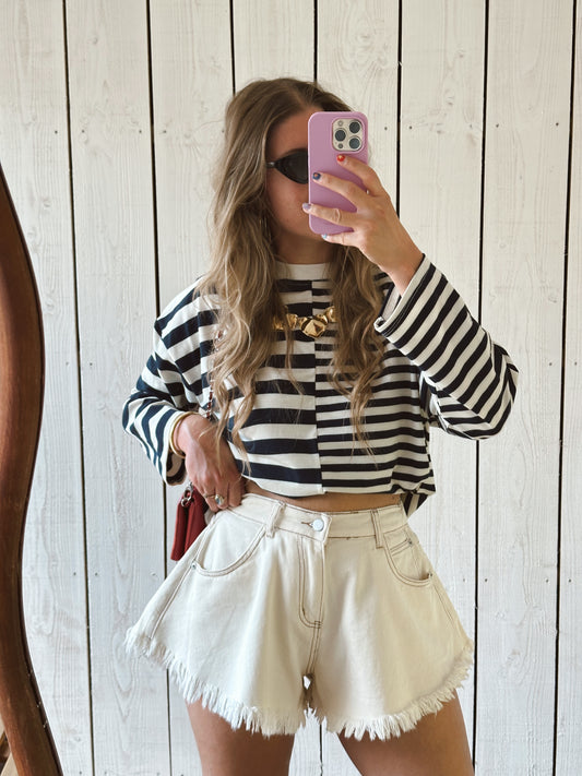 Wijd uitlopende denim shorts gerafeld off-white