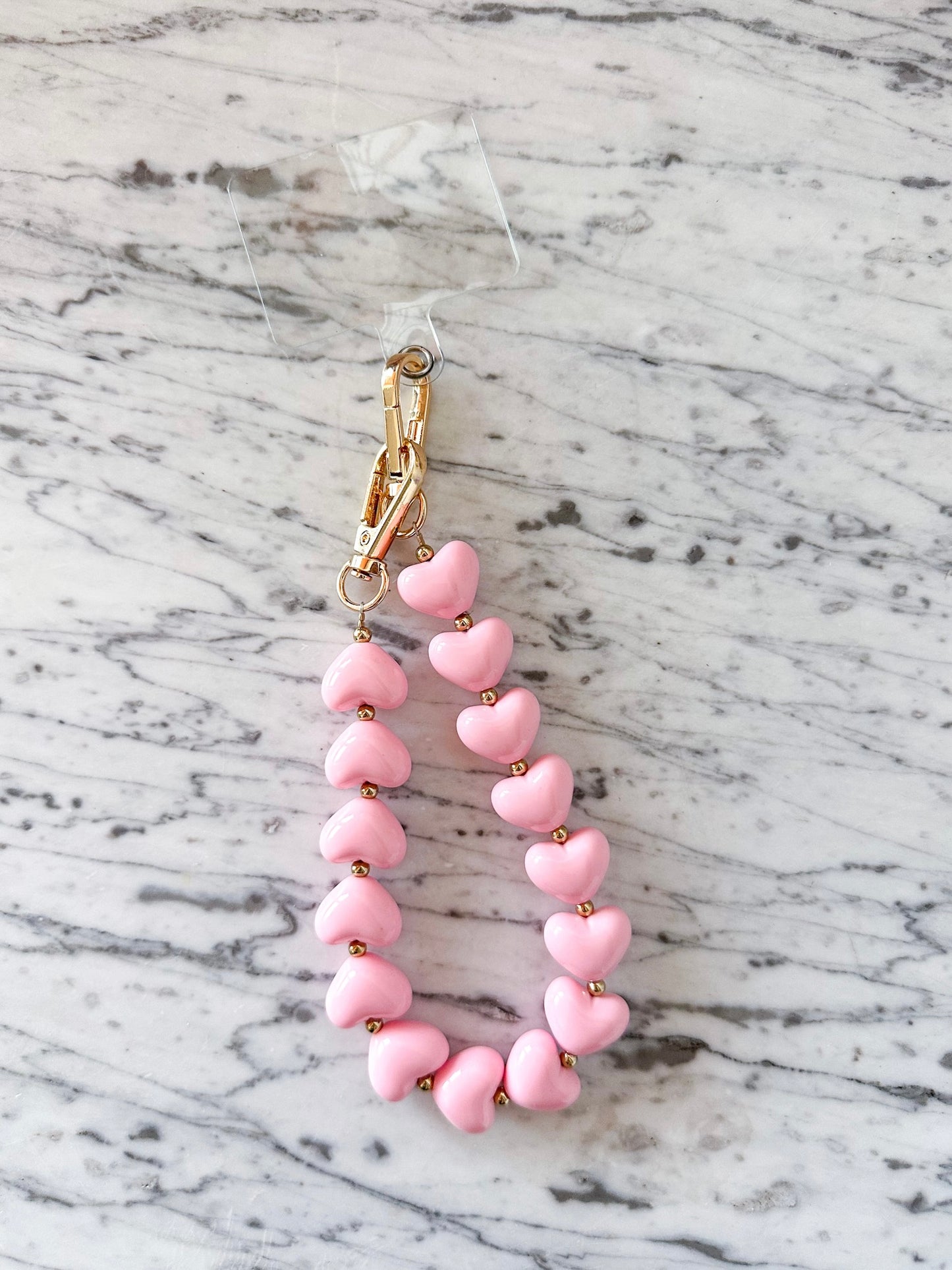 Telefoonkoord met hartjes roze