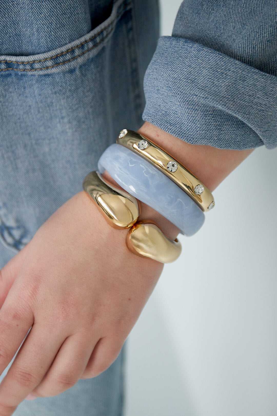 New Beginnings curve bangle armband gold